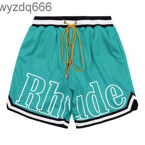 Designer Shorts Rhude Mens Mesh Short Basketball Fashion Beach Elastic Band Pants Men High Quality Street Wear Red Blue Black Purple Pants 5XKC