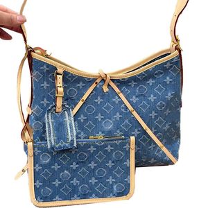 M57782 Womens Luxurys Designers Denim Coussin Tote Carryall Bag Retiro Hands Handbags Shouder Crossbody Women Women مع أكياس الغبار الأصلية TXXJ