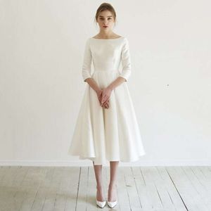 Temperament aftonklänning för kvinnor 2024 Ny bankett vit minimalistisk sommar rese fotogog mitt längd stil
