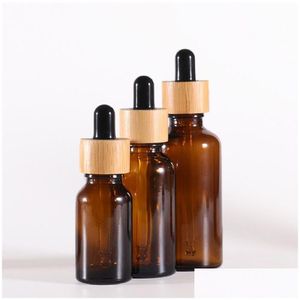 Förpackningsflaskor Partihandel Amber White Glass Droper Bottle Prov Vial With Bamboo Cap för eteriska oljor per kosmetiska vätskor Drop de Dhk7i