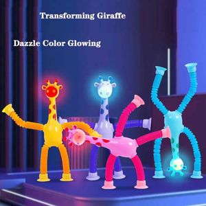 LED -Spielzeuge neue Giraffe -Cartoon -Saugnapfbecher Teleskop -Röhrchen Veränderungen schillernde Farben Glühen Puzzle Interaktive Dekompression Kinderspielzeug 4p S245