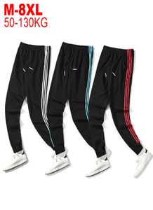 Plusowe męskie spodnie sportowe luźne wersja fitness bieganie spodni letnie trening spodnie dresowe 3 paski LJ2011048034866