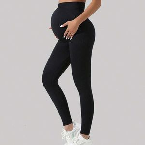 Ny graviditet med hög midja leggings Skinny Maternity Clothes for Pregnant Women Belly Support Sticked Leggins Body Shaper Trousers L240520