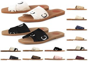 صندل مصمم للسيدات شريحة النعال الخشبية المسطحة في القماش الصيفي شاطئ الأحذية الأزياء sneakers multicolors9721517