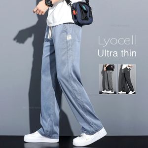 Summer Soft Lyocell Fabric Mens Jeans tunna löst raka byxor dragsko elastisk midja Korea casual byxor 240513