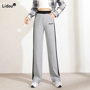Spring Autumn Grey Elastic Waist Slipe Stripe Stripe Sports Recamita Korean Stampa di giunzione tasche pantaloni gambe larghe 240520
