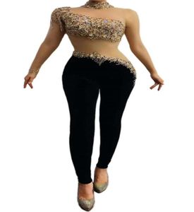 V49 Sexiga kvinnor Se genom Rhinestones Bodysuit Stretch Crystal Mesh Black Jumpsuit Bar Perform Singer Leotard Tights Proom DJ Par7709569
