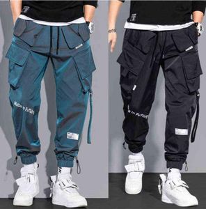 Hip Hop Streetwear Joggers Pants Men Dent Casual Cargo Pant Spodni High Street Elastic Talia luźna laser Harem Pant Boys G2204133747351