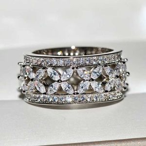 Designermärke 925 Sterling Silver Luxury Set High Carbon Diamond Ring med ihålig snidad blomma för män och kvinnor