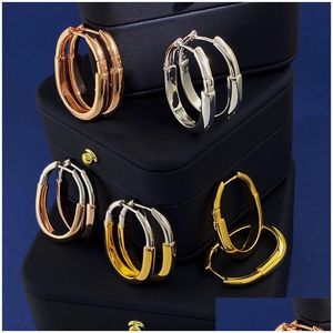 Hoop Huggie 2024 New Style Lock Earring Oval Smooth Small Earrings Cool Fashion Euro-AmericanCarder Two-Tone Color Women Hie Drop OtLQV