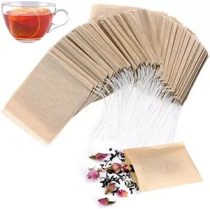 100 PCS/LOT TEA FILTER BAG STRAINENS TOOLS NATURAL UNLECHEDED WOOD PULP PULP PAPER DOWSTRING POUCH With Drawstring Pouch JJ 5.20付き空のバッグ
