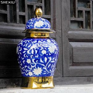 Lagerflaschen Blau und weißes Porzellan Generalglas Ingwer Gold plattiert Keramikkosmetische Behälter Dekorative Blumenvasen