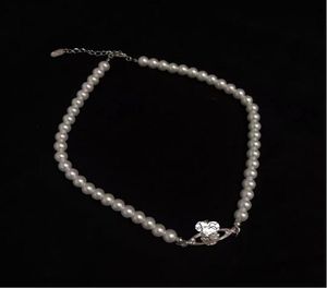 Nowy butikowy wisiorek dla kobiet pełen diamentów Saturn Pearl Naszyjnik łańcuch łańcuchowy łańcuch szyi