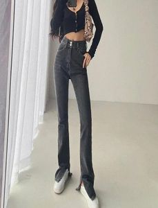 Slim jeans with high waist and floorlength slit01234561135807