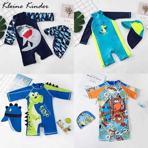 7zfp Swimsuit da bagno per bambini da bagno con un pezzo da bagno con cappello da sole UPF50 protezione UV a maniche lunghe Dinosaur per bambini costume da bagno D240521