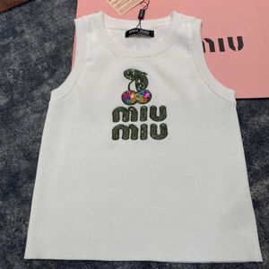 MI早春に新しい甘いスタイル重工業チェリーブロッサムビーズ刺繍文字デコレーションセブレスニット汎用ベスト