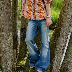 Мужское панк -стиль сплайсинг карманная вышивка большие расклешенные джинсы мужские винтажные четыре сезона синие брюки уличные брюки.