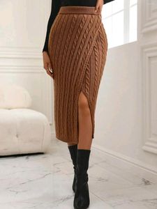 Свитер юбки Женщины эластичная юбка для талии Твист -щель и осень