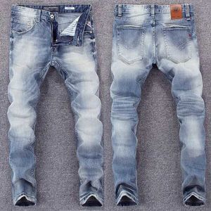 Męskie spodnie w stylu włoskim modne dżinsy retro jasnoniebieskie ultra-cienkie łzy dżinsy wysokiej jakości męskie spodnie retro designer spodnie hombre J240510