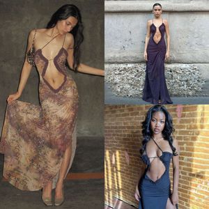 2024 Yaz Seksi Elbise Kadın Giyim Tasarımcısı Moda Modaya Modaya Doğru Kadınlar Yeni Spagetti Kayışları Ahşap Kulak Kenar Baskılı Gevşek Açık Göbek Elbiseleri Kayma Tam Uzunluk