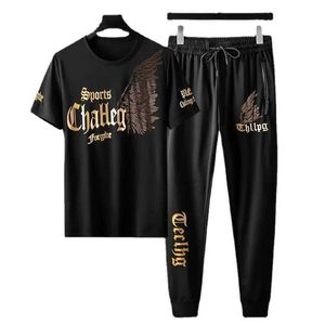 Herrspårar Mens Black Suit Korean Fashion Flywings Mönster Hot Diamond T-shirt och byxor Tvådelad kostym Mens Jogger Sportswear J240510