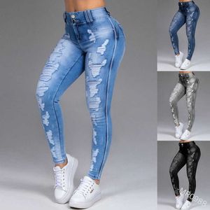 Jeans femininos com buracos mostram calças finas de calça feminina