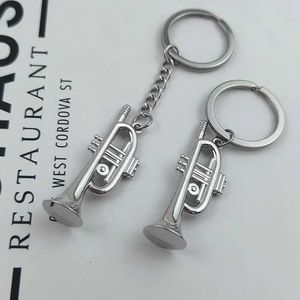 Keychains Lanyards Horn Pendant Keychain Mens Simulated Horn Instrument Form Pendant Keychain Car Accessories Keychain Fashion Subuly Gifts Q240521