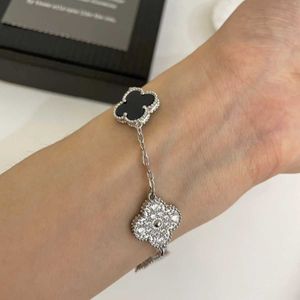 Modeexperter rekommenderar Vanly smycken armband fyra bladklöver fem blomma kvinnliga silver 18k guld naturliga och med original logotyp vanedbox