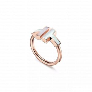 Bröllopsringar Fashion Designer X-formad rostfritt stål Sier Love Ring Cross mellan diamanter Män och kvinnor Rose Gold Jewelry Par OT2TF