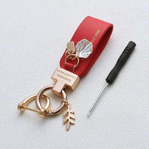 Keychains Lanyards New Fashion Leaf Shell Pendant Keychain PU Leather Keyring Womens Hand Rope Car Key Phone Charm Stand Couple Gift Basket Q240521
