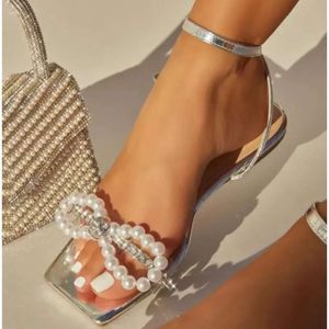 Neue Sandalen mit Sommerbogen Frauen Perle Flat Heels eleganter Strassparty Ladies Schuhe Plus Size 42 Sandalien 04a