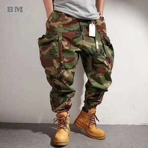 Męskie spodnie plus amerykańskie funkcje zewnętrzne Camo taktyczne spodnie ładunkowe męskie spodnie Japan HARAJUKU Wysokiej jakości bagaż Jogger Y240522