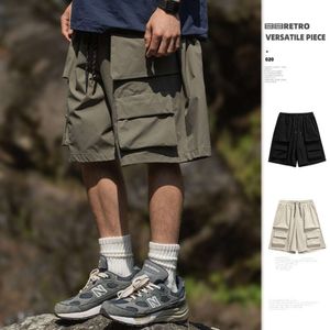 Outdoor functional three-dimensional large pocket workwear shorts for men's summer new straight tube loose casual five part pants M522 30