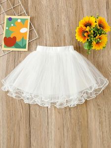 Saias novas 2024 Summer Fashion Girls infantil Casual Cute Solem de cor sólida Salia de gaze Puffy Galze Skirt Skirt Y240522