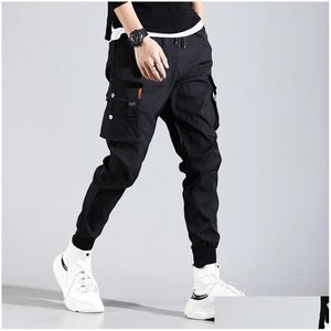 Mens Pants Hip Hop Men Pantalones Hombre High Street Kpop Casual Cargo med många fickor joggar Modis streetwear byxor harajuku dr otxnc