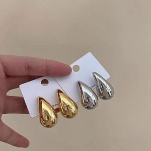 Brincos de gotas de designer de argola de ouro para mulheres 18K Triângulo de aro de aro de aro de ouro Luz brilhante com cartas de moda Retro Personalidade Stud para festas Jóias de joalheria Garotas