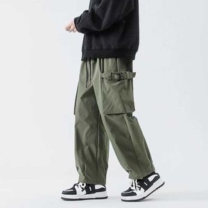 Men's Pants Street clothing black mens harem jogging pants mens goods pants 2024 hip-hop casual pocket sports pants oversized fashion close-up pants Y240522