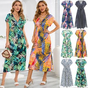 Fashionabla bat ärmar V-ringning Öppen rygg rem klänning Sommarkvinnor tryckt långa kjol V-ringklänning Evening Party/Beach Dress/Floral Sundress