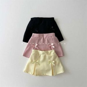 Kjolar kjolar koreanska barn klädflicka våren nya fasta färgbyxor shorts veckad kjol tutu kjol wx5.21