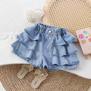 Shorts Shorts Childrens Summer Clothing Girls som bär denim Shorts New Thin Childrens Cake Lace Leather Pants WX5.22