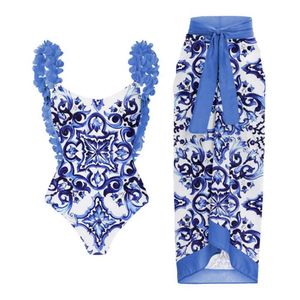 Kvinnors badkläder blå tryckt en bit baddräkt kvinnor mode blommor rem rygglöst sexig smal bikini rem strand kjol hög midja klippt badkläder t240523