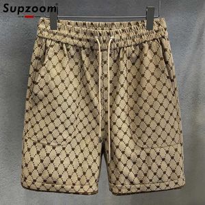 Męskie spodenki Supzoom 2022 Nowa przybycie gorąca wyprzedaż popularna lato luźna luźna męskiej mody mody High Street Sense Sense Criss-Cross Shorts Men J240522