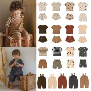 Sommar oz märke overaller baby boy moon trint t shorts shorts kostym barn flickor äppel dot casual tops barn designer kläder tees l2405