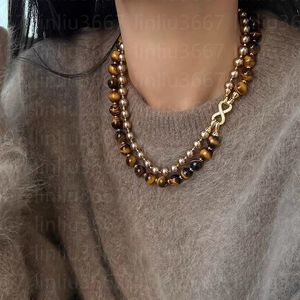 Collana di pietra per gli occhi di tigre donna maglione di lusso catena oro cravatta marrone perla marrone retrò micro staccabile intarsia