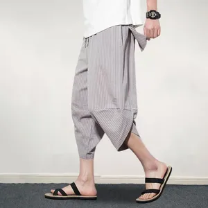 Pantaloni da uomo harem a strisce stampa verticale alla moda estate ritagliata con elastica core