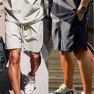 Mens Nylon Shorts Metalliska iriserande reflekterande bottnar överdimensionerade sommar korta byxor män kvinnor hiphop streetwear mg210032