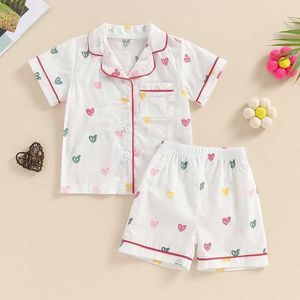 Pijamas pijamas crianças e meninas pijama definido com moda de verão impressão de coração curto com lapela de lapela de pijama de manga curta de manga curta wx5.21