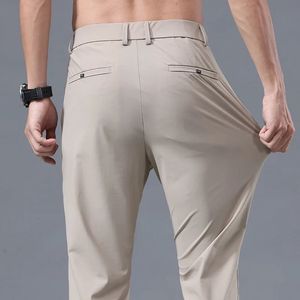 Summer Stretch Soft Ruit Pants Mężczyźni cienki moda elastyczna talia koreańska szczupła marka ubrań zwykłe formalne spodnie mężczyzn 240523