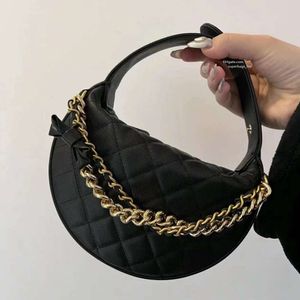 Mini bolsa de luxo Mulheres bolsas de malas para designer de diamante Bolsa de ombro xadrez de diamante Bola de moda Bolsa de couro real bolsas femininas
