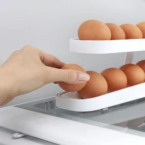 Lagringsflaskor rullande ägg dispenser kylskåp arrangörer containrar lådan automatisk glidande spiralhållare hem kök prylar